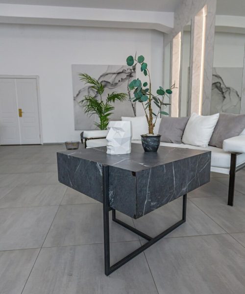 stylish-bright-modern-bedroom-interior-with-decorative-niches-with-led-lighting-huge-panoramic-window-gray-white-colors-geometric-shapes_267786-6503